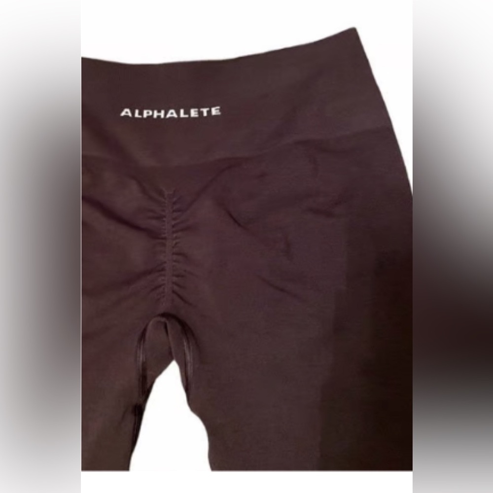 Size Small Alphalete Amplify leggings. Never worn. Dark chocolate brown.